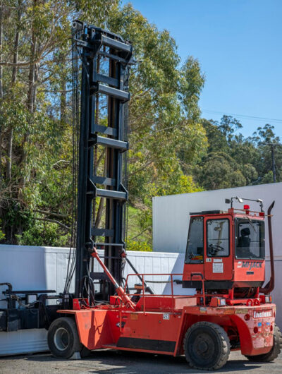 Container handler on an equipment dealer’s lot, showing the high-value inventory behind equipment dealer insurance risks